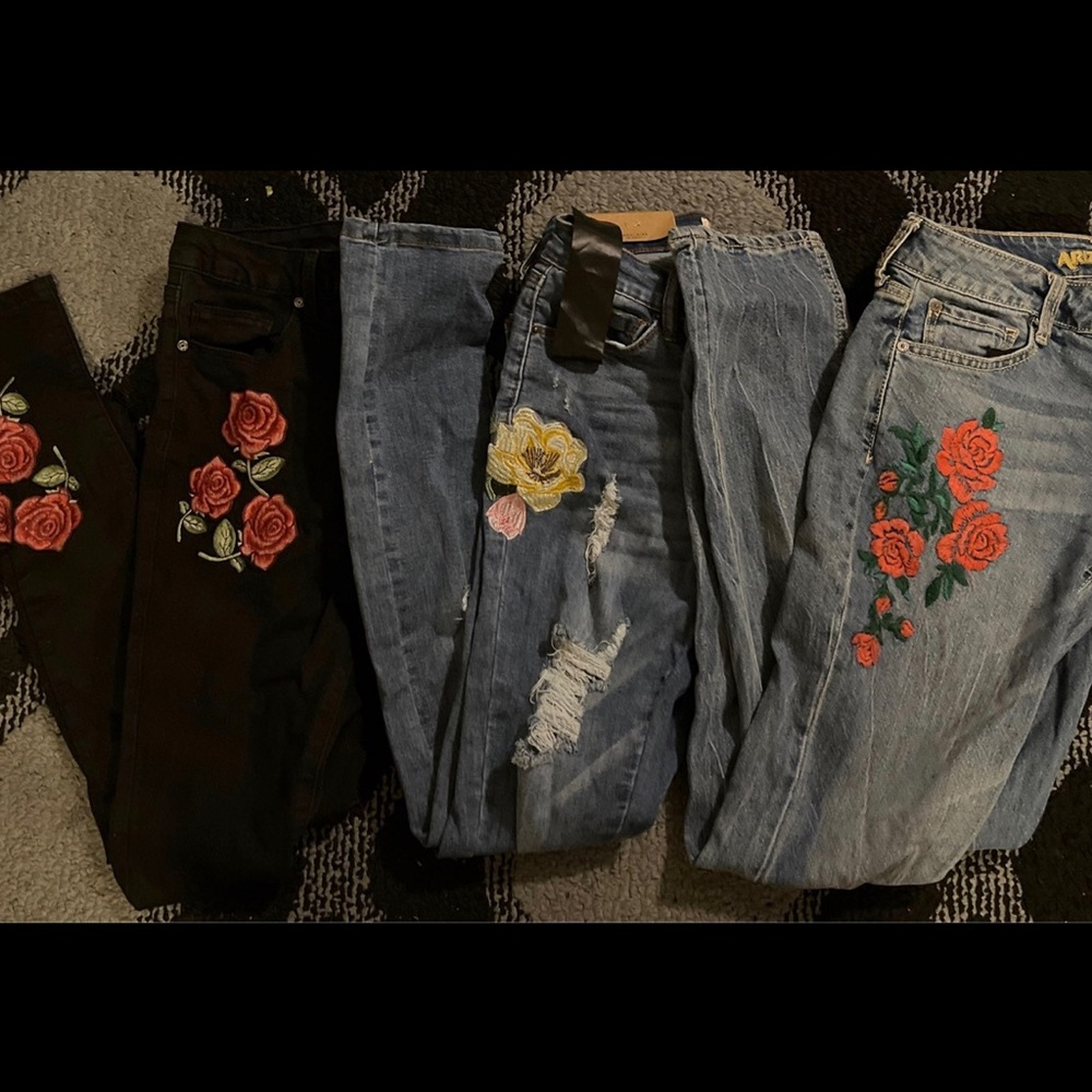 Bundle of embroidered denim jeans